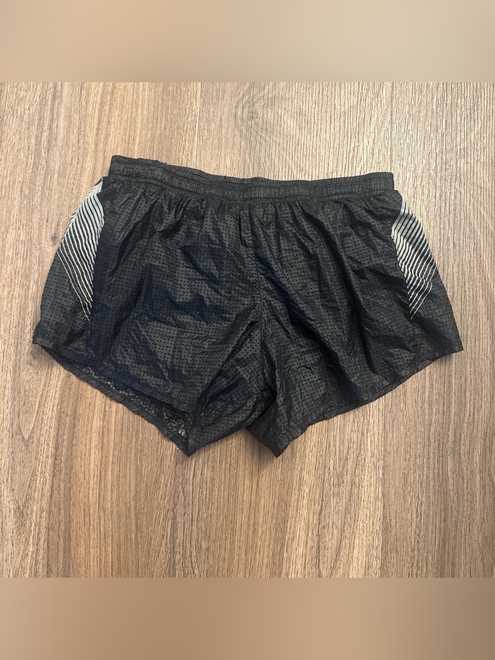 Oiselle black nylon perforated, running shorts with grey diagonal stripes sm